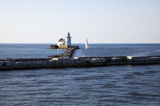 Yacht by Cleveland Harbor West Pierhead - seen from Lake Erie.