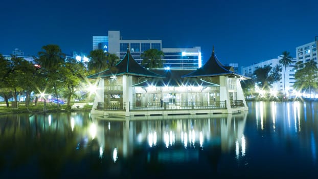 Night in the park lake reflection building