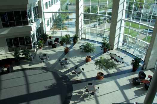 A wide open space inside a modern glass building