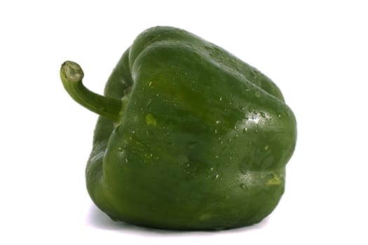 Close view of a isolated green bell pepper on a white background