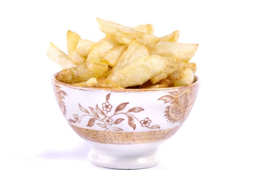 Close up view of a bunch of fried potatoes in slices. 