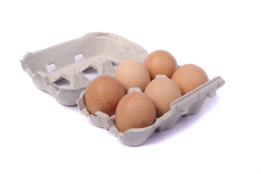 Close up view of a six pack egg card-box isolated on a white background.