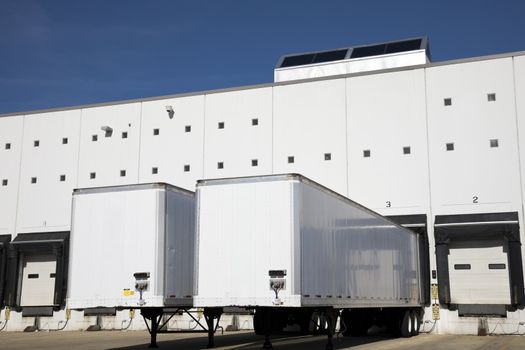 Loading docks under blue sky.