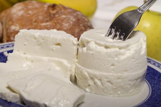 View of a dish of fresh cheese on a plate.