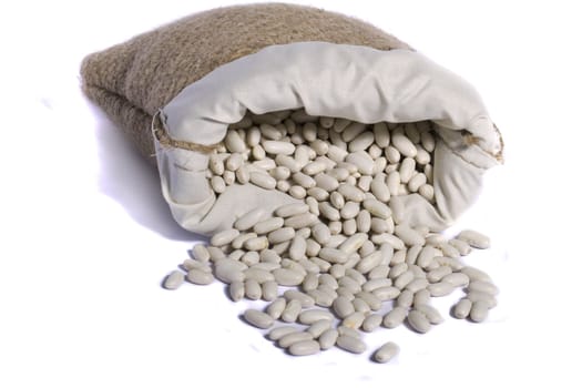 View of a sack of long white beans isolated on a white background.