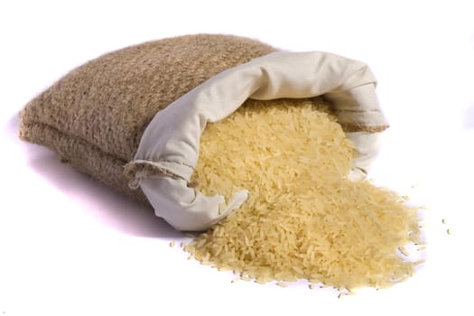 View of a sack of yellow rice isolated on a white background.