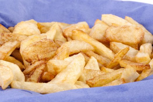 Close up view of a bunch of fried potatoes in slices. 