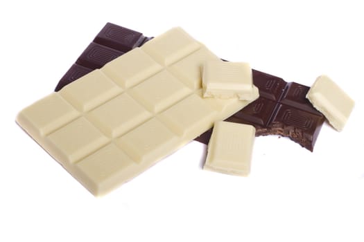 Close view of a dark chocolate bar isolated on a white background.