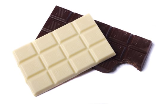 Close view of a dark chocolate bar isolated on a white background.