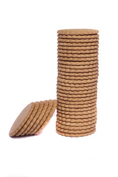 View of a tower of biscuits isolated on a white background.