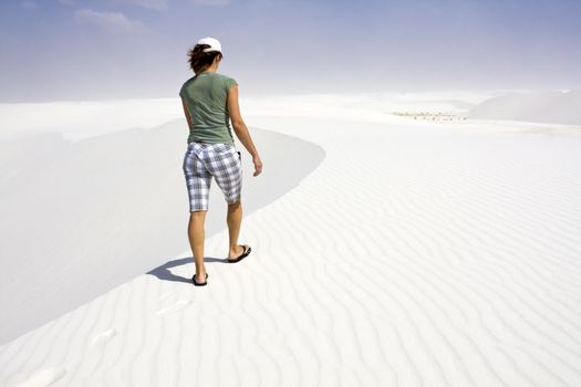 Girl walking dunes - White Sand Dunes National Park