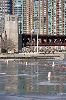 Lake Shore Drive Bridge in winter scenery. Chicago, Illinois and USA flags included.