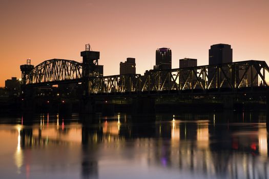 Sunset in Little Rock, Arkansas. Blurred barque in the foreground.