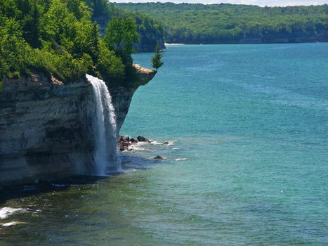 Spray Falls plunges into Lake Superior at Pictured Rocks National Lakeshore, Michigan.