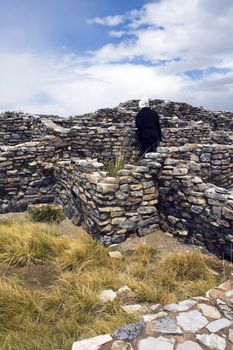 Tourist in Gran Quivira Ruins, New Mexico.