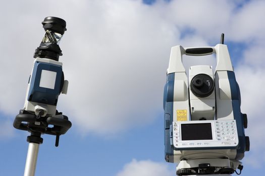 Robotic station equipment against cloudy sky.