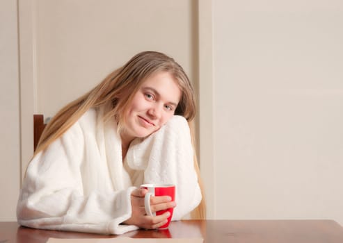 young woman in the mornig with coffee