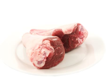 Fresh red meat, chops, isolated on white plate