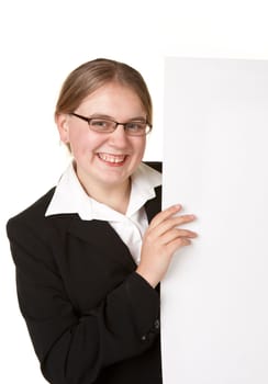 business woman looks around a white poster sign space
