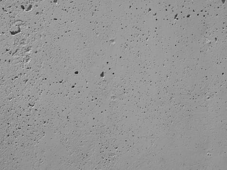 Reinforced concrete wall useful as a background