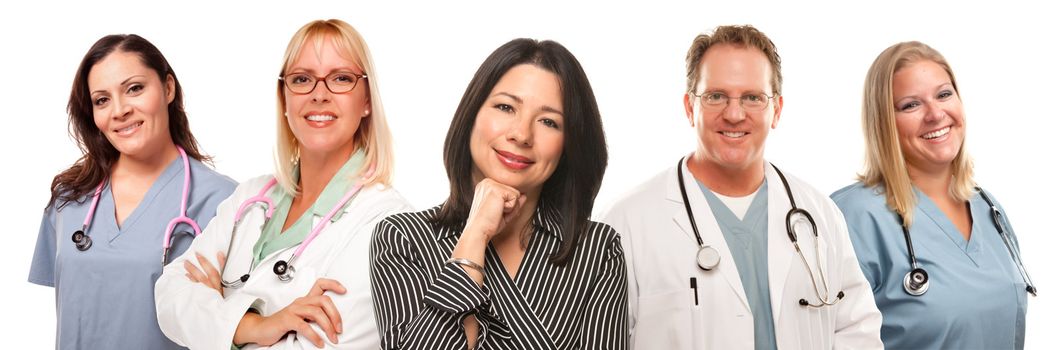 Beautiful Hispanic Woman with Male and Female Doctors or Nurses Isolated on a White Background.