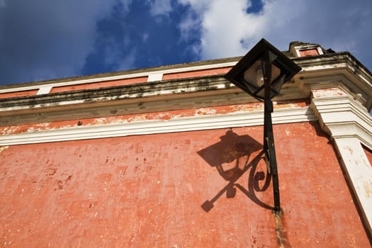 Lamp on the wall - seen in Antigua, Guatemala.