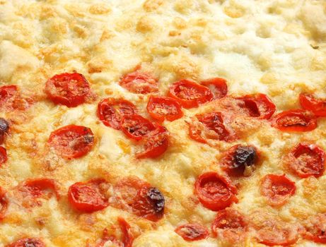 Italian Pizza with tomato topping useful as a background