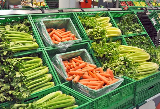 Vegetables at a supermarket, including carrots and celeries