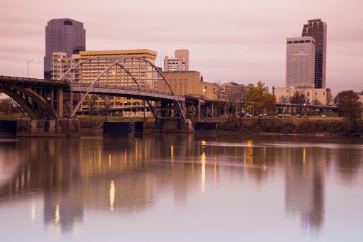 Sunrise in Little Rock, Arkansas. Blurred barque in the foreground.