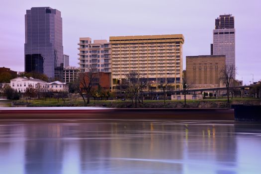 Sunrise in Little Rock, Arkansas. Blurred barque in the foreground.