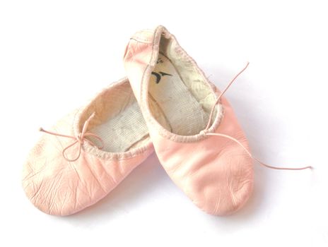 Young ballerina dancing shoes