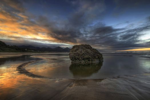 Rock at Low Tide on Cannon Beach Oregon at Sunrise
