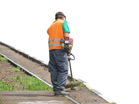 Man working with string trimmer lawn mower machine
