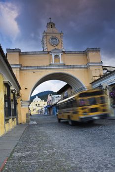 School bus under the Arco de Santa Catalina