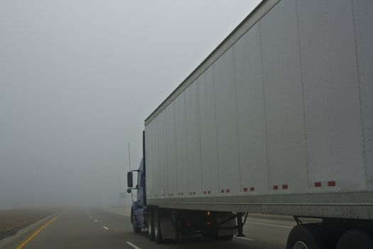 Foggy Day - driving semi-truck.