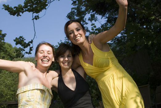 Three girls having fun at the beach.