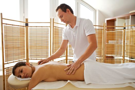 Young woman receiving massage