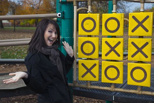 Happy winner - smiling girl in the park.