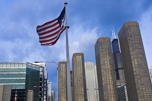 US flag and Presidential Towers in Chicago, IL.