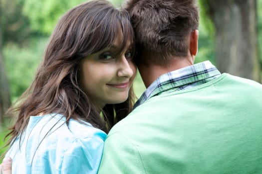 Portrait of young woman with boyfriend