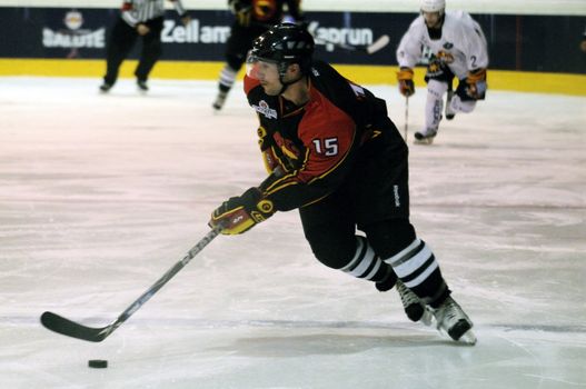 ZELL AM SEE, AUSTRIA - SEPTEMBER 3: Red Bulls Salute Tournament. Forward rush of Brett McLean (Bern). Game Jokerit Helsinki vs. SC Bern (Result 0-2) on September 3, 2010 in Zell am See