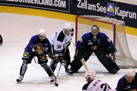 ZELL AM SEE, AUSTRIA - SEPTEMBER 4: Red Bulls Salute Tournament. Traffic in front of Jokerit goalie. Game Jokerit Helsinki vs. TPS Turku (Result 8-3) on September 4, 2010 in Zell am See