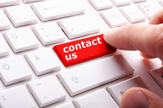 word contact us on red keyboard key