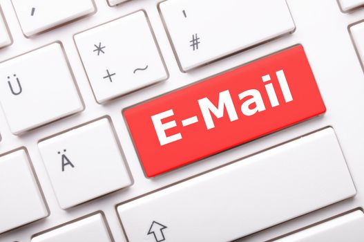 email e-mail or internet communication concept with key on keyboard