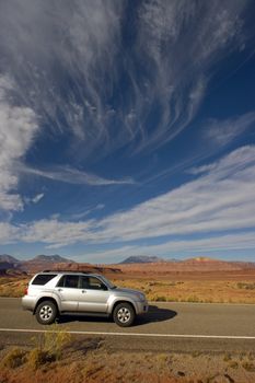 Silver SUV driving in Utah.