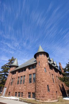 Lake Forest College building under crazy clouds.