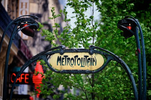 Signboard by entrance in subway. Paris. France