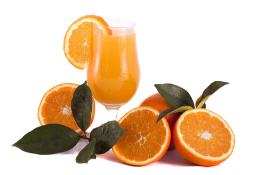 Detail view of a fresh made glass of orange juice isolated on a white background.