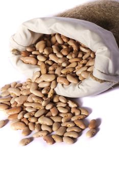 View of a sack of red beans isolated on a white background.