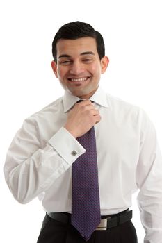 Happy businessman fixing or straightening tie.  White background.